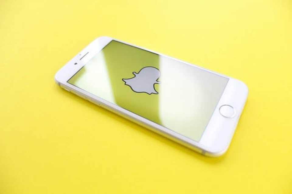 Image of a phone with the Snapchat standard chat application